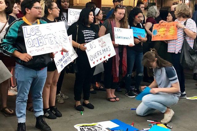 Protesters gathered to welcome children separated from their families reportedly arriving at LaGuardia Airport